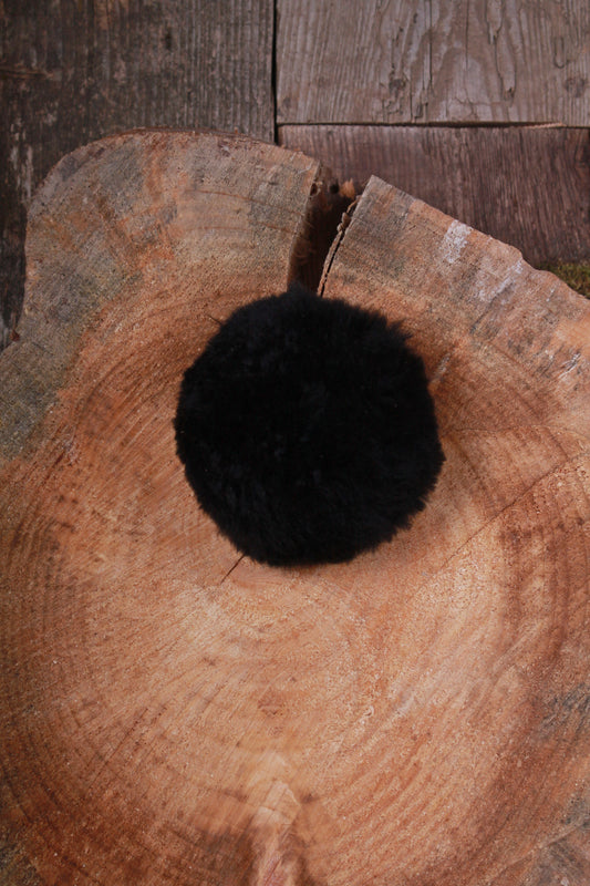 Gros pompon en fourrure d'alpaga noir